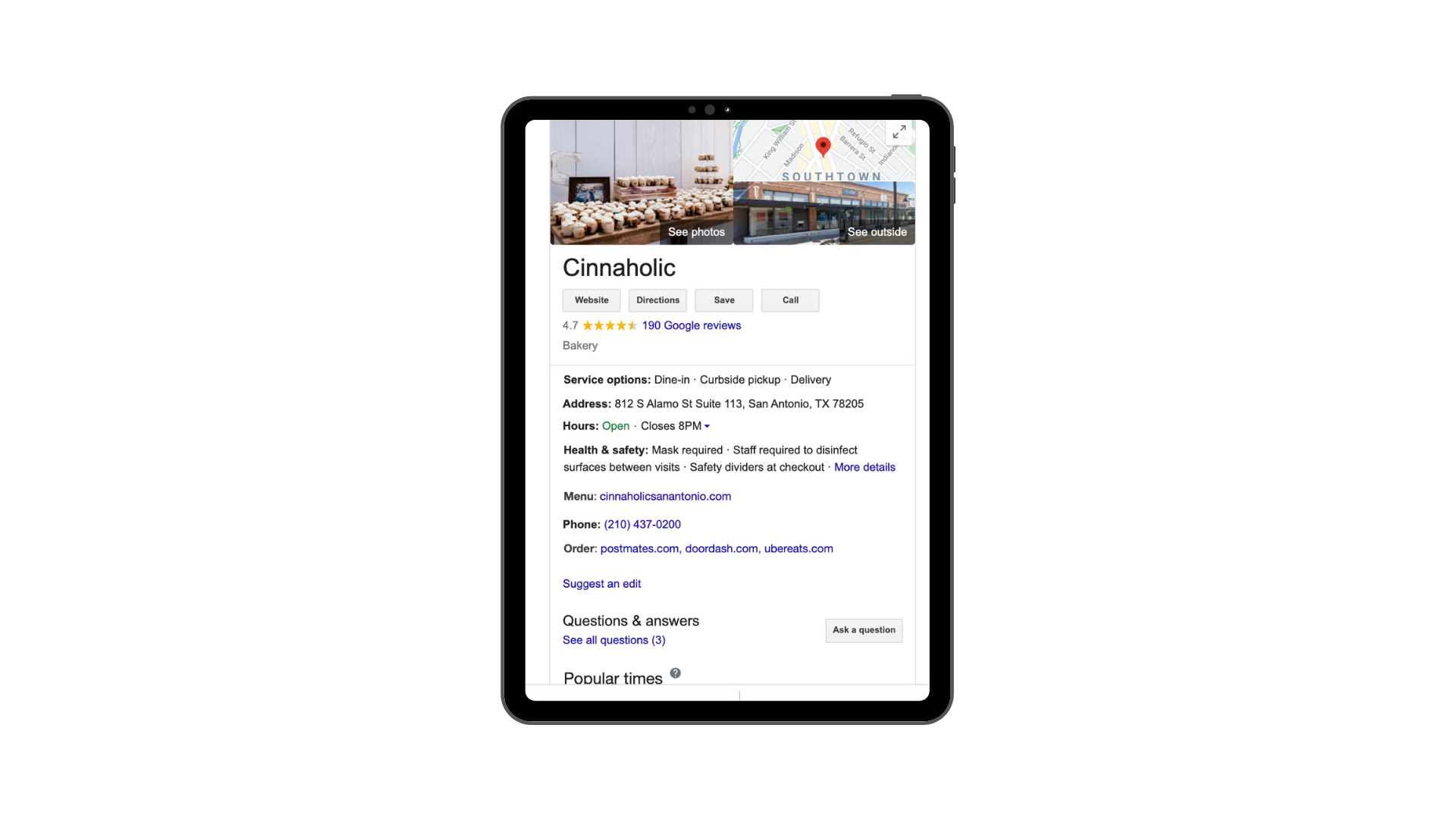 A tablet displaying the Google Business Profile for the Cinnaholic bakery in San Antonio with details and location.